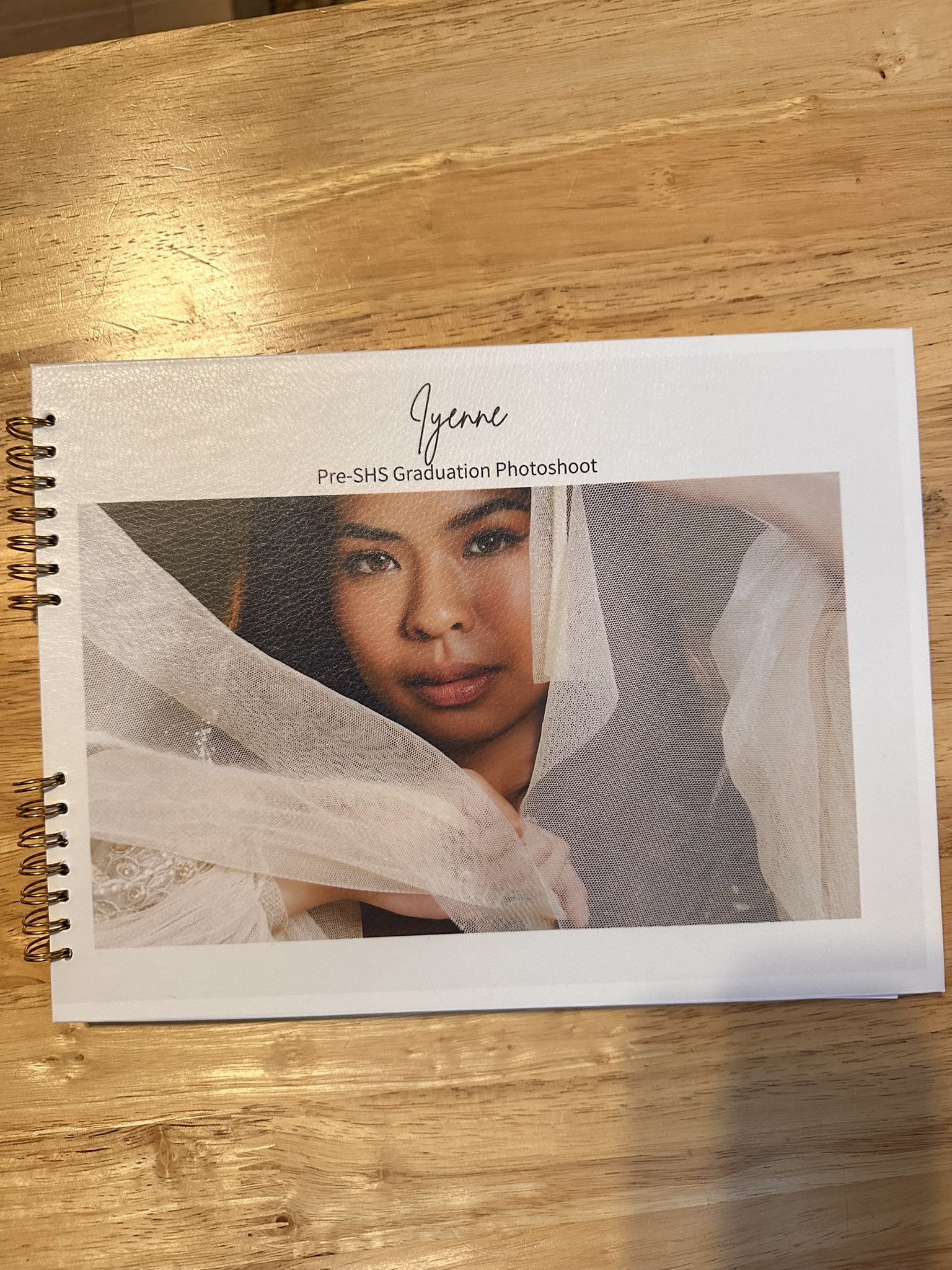 Finished HEARTPRINTS Photo Journal featuring Iyenne's pre-senior-high-school graduation photoshoot